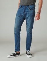 Lucky Brand 411 Athletic Taper Coolmax Stretch Jean Winfield